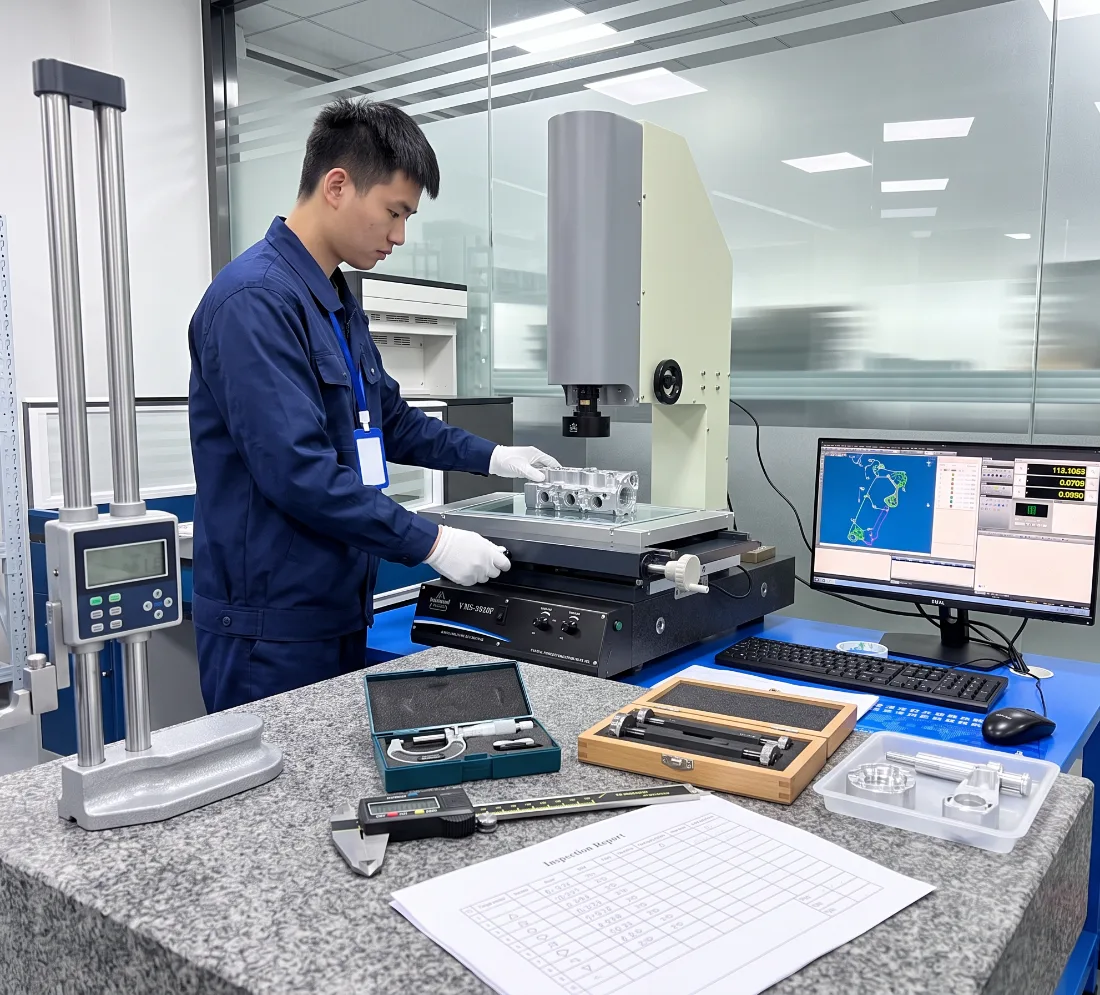 HERO Precision inspector measuring a machined part on the vision measuring system, with height gauge, micrometer and inspection report