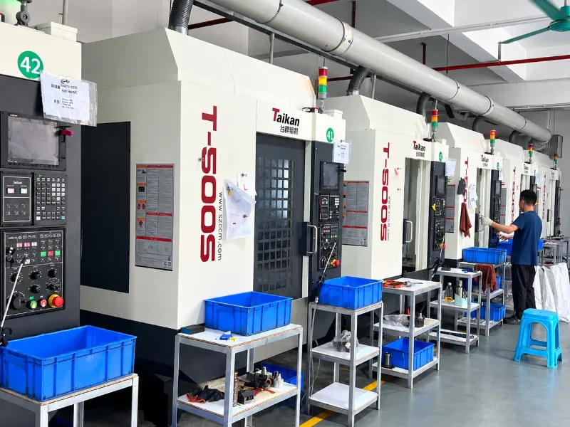 CNC machining center with operator